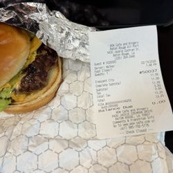 WOW Cafe - Menu says $10.99 for a burger but I was charged $11.99