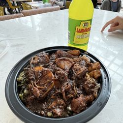 Scotch Bonnet - Stew chicken with rice n beans and some kind of collard greens.