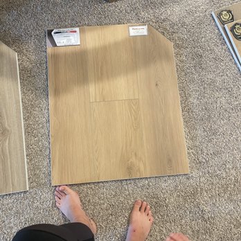 Floors For Living - a person standing on the floor - Carpeting Near Me - Conroe, Texas