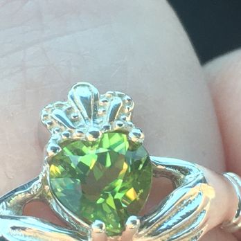 Tracy Jewelers - my ring the day I got it back, the peridot already crooked - Jewelry Near Me - Spokane Valley, Washington Tracy Jewelers - my ring the day I got it back, the peridot already crooked - Jewelry Near Me - Spokane Valley, Washington