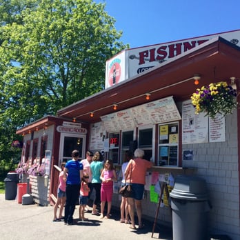 Fish Net - a group of people standing outside of a restaurant - Seafood Near Me - Blue Hill, Maine Fish Net - a group of people standing outside of a restaurant - Seafood Near Me - Blue Hill, Maine