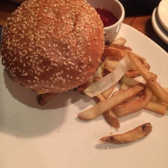 Outback Steakhouse - Bloomin Burger that I ordered and my portion of fries that they brought me. Burger and cheese had already cooled down. - Steakhouses Near Me - Burleson, Texas