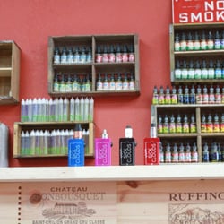 Vapology101 Orlando - Try our premium super high VG e-juice lines  on our 12 feet custom wooden wine crate tasting bar.