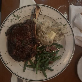 Texas - 22oz bone in ribeye - Steakhouses Near Me - Richardson, Texas Texas - 22oz bone in ribeye - Steakhouses Near Me - Richardson, Texas