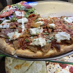 La Bona Pizza - Looks great you know looks can be deceiving I give it a 7.5 out of ten. It does the job when you're serving or craving pizza