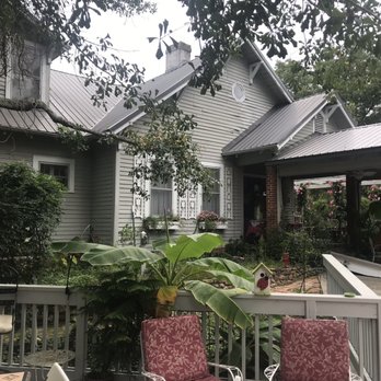 The Gray House - a porch with chairs and a table - Desserts Near Me - Starr, South Carolina The Gray House - a porch with chairs and a table - Desserts Near Me - Starr, South Carolina