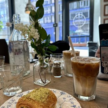 maman - pistachio chocolate croissant and an iced latte - Bakeries Near Me - Washington, DC, District of Columbia maman - pistachio chocolate croissant and an iced latte - Bakeries Near Me - Washington, DC, District of Columbia