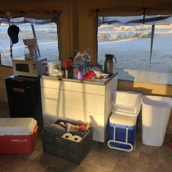 Yosemite RV Resort - Small kitchen area, fridge, microwave, hot plate for cooking, and the drawers have cooking utensils and plates etc. - RV Parks Near Me - Coarsegold, California Yosemite RV Resort - Small kitchen area, fridge, microwave, hot plate for cooking, and the drawers have cooking utensils and plates etc. - RV Parks Near Me - Coarsegold, California