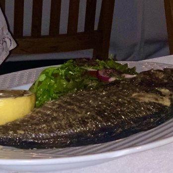 Babylon - Mediterranean Dorado fish with arugula salad - Mediterranean Near Me - Miami Beach, Florida Babylon - Mediterranean Dorado fish with arugula salad - Mediterranean Near Me - Miami Beach, Florida
