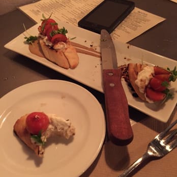 The State - Half eaten bruschetta - New American Near Me - Redlands, California