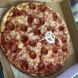 Pizza Mia Pasta - Cauliflower pizza topped with with pepperoni