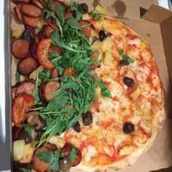Pacino's Italian Family Restaurant - This is how it arrives and it is missing toppings ( which we paid a dollar extra for each one)