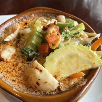 Thai Thai - a bowl of soup on a plate - Thai Near Me - Bowling Green, Kentucky Thai Thai - a bowl of soup on a plate - Thai Near Me - Bowling Green, Kentucky