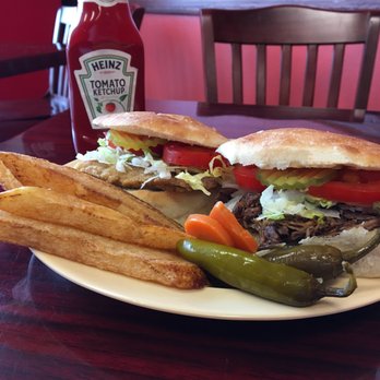 El Padrino - a plate with a sandwich and french fries - Mexican Near Me - Laredo, Texas