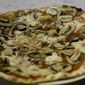 Baonecci Ristorante - a mushroom pizza on a plate - Italian Near Me - Frisco, Texas Baonecci Ristorante - a mushroom pizza on a plate - Italian Near Me - Frisco, Texas