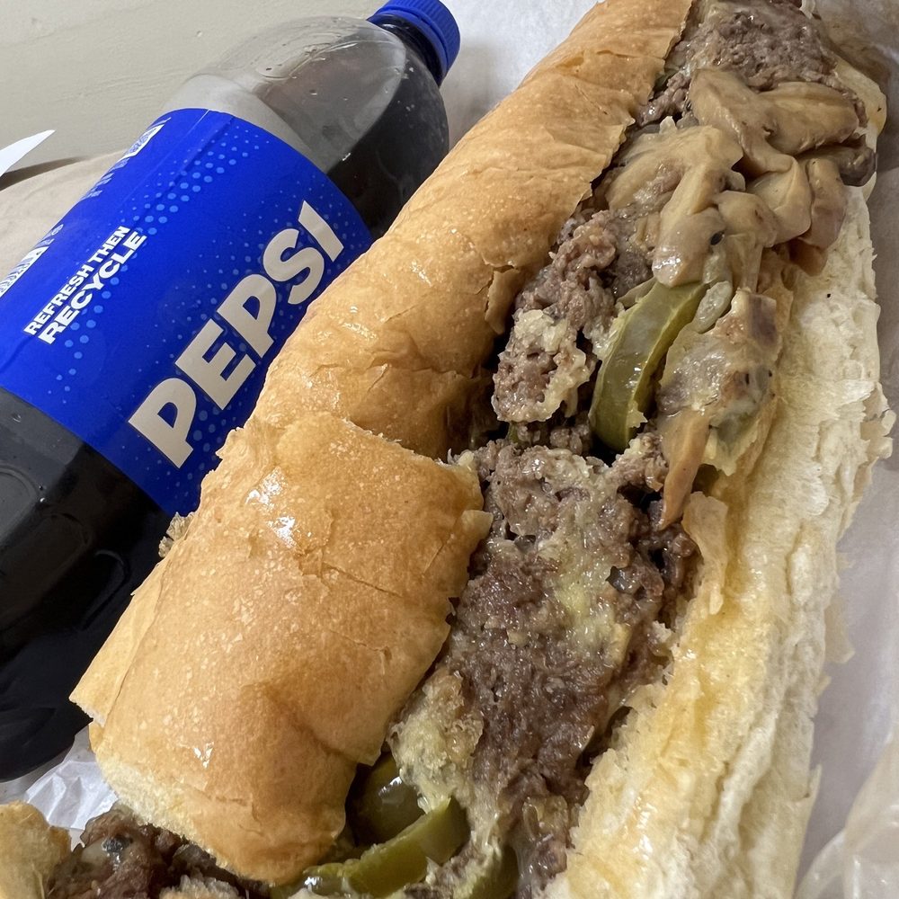 Pickle Barrel - Close up. Mushroom Steak with jalapeños. Liter of pepsi for scale. So delicious! - Sandwiches Near Me - Bozeman, Montana