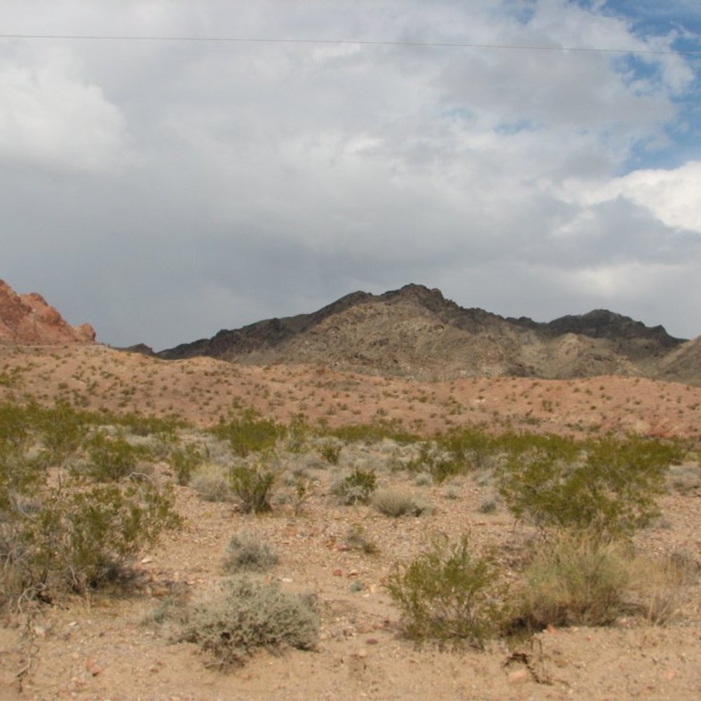 Red and Black Mountain - In the early part of the hike - Red Mountain on the left and Black Mountain on the right. - Hiking Near Me - Boulder City, Nevada Red and Black Mountain - In the early part of the hike - Red Mountain on the left and Black Mountain on the right. - Hiking Near Me - Boulder City, Nevada