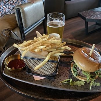 Moon's Daughter - Thompson San Antonio - House burger and fries with a delicious beer - Mediterranean Near Me - San Antonio, Texas