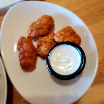 Applebee's Grill + Bar - The 5 wings for a dollar. I ate one before the picture. - Sports Bars Near Me - Peru, Illinois Applebee's Grill + Bar - The 5 wings for a dollar. I ate one before the picture. - Sports Bars Near Me - Peru, Illinois