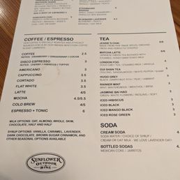 Menu - Menu from Sunflower Outdoor & Bike in Lawrence, KS, offering smoothies, coffee, tea, and bottled sodas, with options for add-ins and flavor notes.