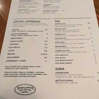 Sunflower Cafe - Menu - Menu from Sunflower Outdoor & Bike in Lawrence, KS, offering smoothies, coffee, tea, and bottled sodas, with options for add-ins and flavor notes. - Cafes Near Me - Lawrence, Kansas