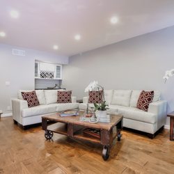 Open space in the living room with wine bar .