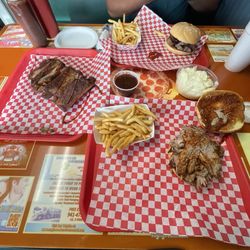Texas Best Barbecue - Pulled pork sandwich with side of fries. Beef Brisket Sandwich with a side of fries and mash potatoes. Rack of St. Louis ribs