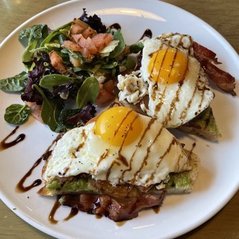 Sunny Side Solana - "Let's make a toast" Bacon Tomato eggs sunny side up. - Breakfast & Brunch Near Me - Solana Beach, California Sunny Side Solana - "Let's make a toast" Bacon Tomato eggs sunny side up. - Breakfast & Brunch Near Me - Solana Beach, California