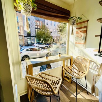 The Little Local - a table and chairs in front of a window - Coffee & Tea Near Me - Hoboken, New Jersey The Little Local - a table and chairs in front of a window - Coffee & Tea Near Me - Hoboken, New Jersey