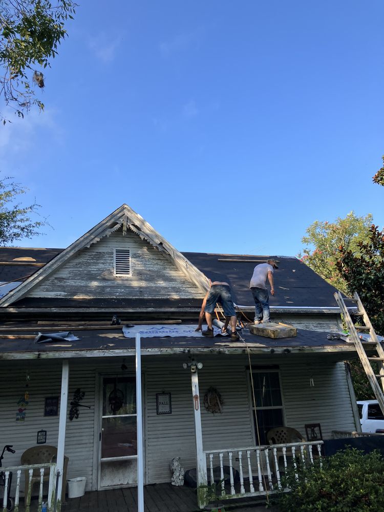 Slide of Danny Smiths Roofing