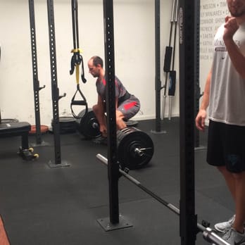 COR - Olympic level athlete performing deadlift. - Physical Therapy Near Me - San Jose, California