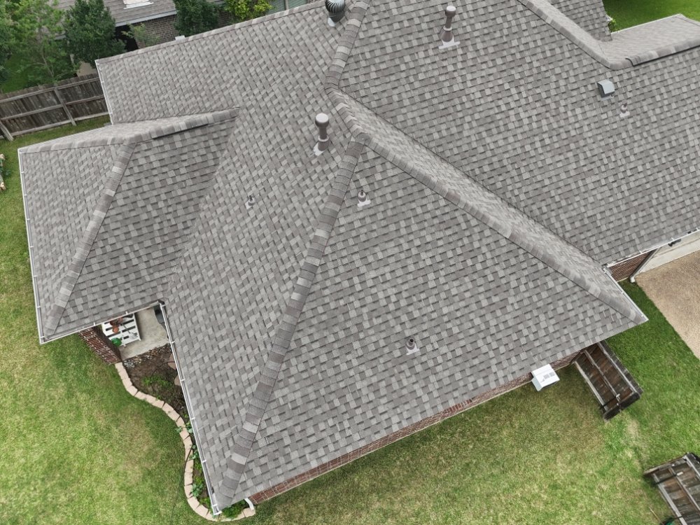 Slide of The Roofing Consultants