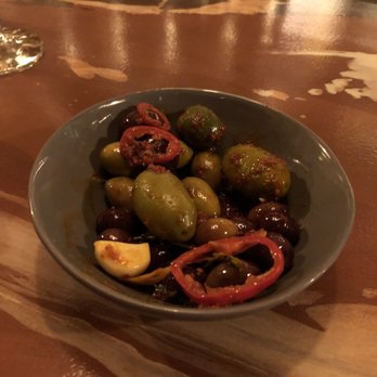 Restaurant Adarra - Warm olives, peppers, harissa and citrus - Modern European Near Me - Richmond, Virginia