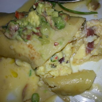 Tilia - Crab Breakfast Crepe - Sweet corn, avocado, bacon and softly scrambled eggs inside - New American Near Me - Minneapolis, Minnesota Tilia - Crab Breakfast Crepe - Sweet corn, avocado, bacon and softly scrambled eggs inside - New American Near Me - Minneapolis, Minnesota