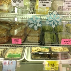 Packaged cake rolls and vegetarian snacks.