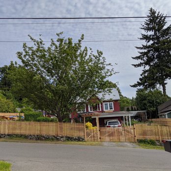 Webb Fencing Pros - Chris did not hesitate to place Cedar Posts on pipes with concrete reinforcement in our rock wall, on our concrete ledge! - Fences & Gates Near Me Webb Fencing Pros - Chris did not hesitate to place Cedar Posts on pipes with concrete reinforcement in our rock wall, on our concrete ledge! - Fences & Gates Near Me