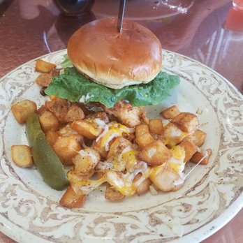 Another Broken Egg Cafe - Fried chicken sandwich was under cooked and lacked flavor. - Breakfast & Brunch Near Me - Tampa, Florida