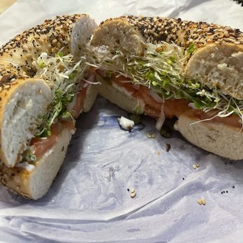 Bagel Cafe 21 - Everything Bagel with vegan cream cheese sprouts tomato capers and onions! - Bagels Near Me - Richardson, Texas