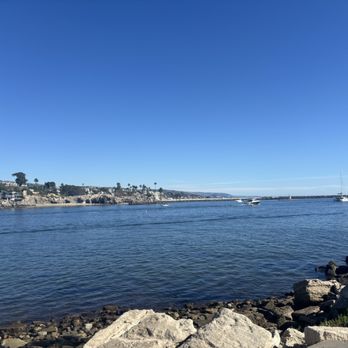 The Wedge - View towards the ocean along the harbor - Beaches Near Me - Newport Beach, California