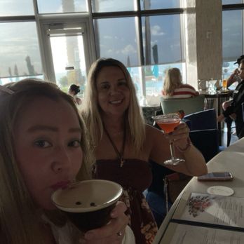 SeaGuini - Opal Sands Resort - The bar top. Very large martini glasses - New American Near Me - Clearwater, Florida