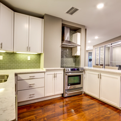 The James Apartments - The kitchen space in 24 hour clubroom equipped with free WiFi and DirecTV.  Residents can reserve space to entertain guests for free as well