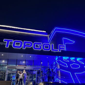 Topgolf - Front at night. - Golf Near Me - Holtsville, New York Topgolf - Front at night. - Golf Near Me - Holtsville, New York