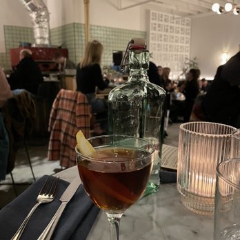 Bar Sur Mer - sao martinho - rye, amontillado sherry, yzaguirre sweet vermouth, peychauds, black walnut bitters, lemon peel - Tapas/Small Plates Near Me - Seattle, Washington