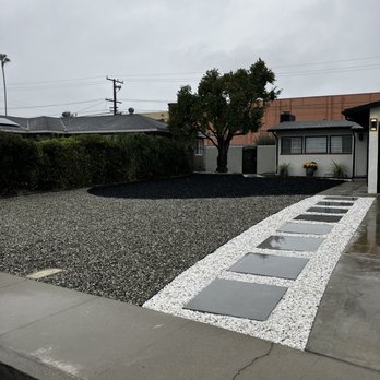 Santana's Landscaping - Front of the home we had patches of dry and good st Augustine..current photo - Landscaping Near Me