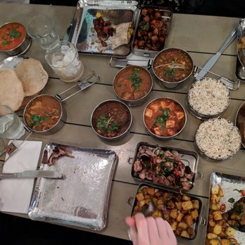 Mowgli - Dinner spread: Gunpowder Chicken, Lamb chops, Paneer, House Lamb Curry, Basmati Rice & Puri Bread - Indian Near Me - Liverpool, XMS