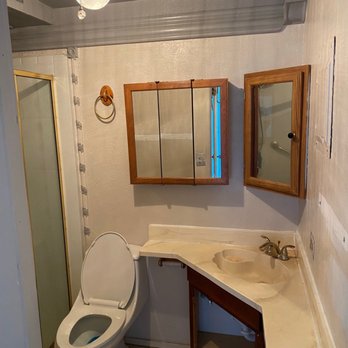 B Construction - Corner show + old vanity = horror movie - General Contractors Near Me