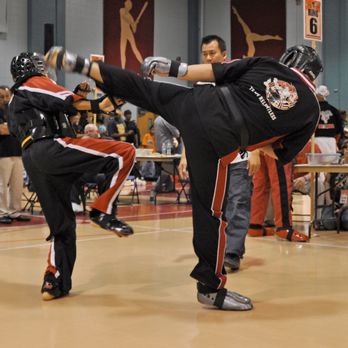 Universal Kempo Club - Team Relentless adult tournament sparring, roundhouse kick to the head - Self-defense Classes Near Me - Rochester, New York Universal Kempo Club - Team Relentless adult tournament sparring, roundhouse kick to the head - Self-defense Classes Near Me - Rochester, New York