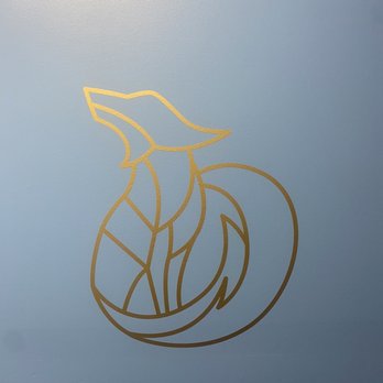 The Fox Den - a gold fox on a blue background - Polish Near Me - Woburn, Massachusetts