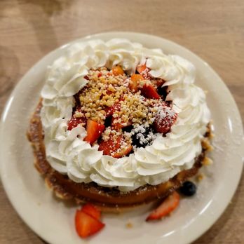 Aloha Stacks - Belgium waffle with blueberries, strawberries,macadamia nuts, and whip cream! - Breakfast & Brunch Near Me - Irvine, California Aloha Stacks - Belgium waffle with blueberries, strawberries,macadamia nuts, and whip cream! - Breakfast & Brunch Near Me - Irvine, California