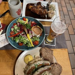 Zum Bären - Sausage and sauerkraut, salad with deep fried augratin feta, and pork knuckle and dumplings